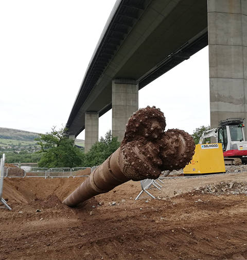 Large drill shoots out of the ground under Erskine Bridge