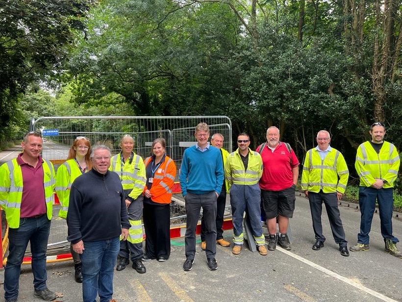 MP Greg Clark (centre) standing with operational teams next to the work area along Pembury Road in Tunbridge Wells