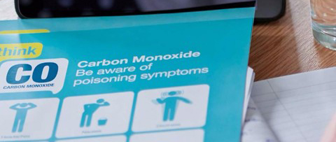 photograph blue leaflet with information about carbon monoxide on it