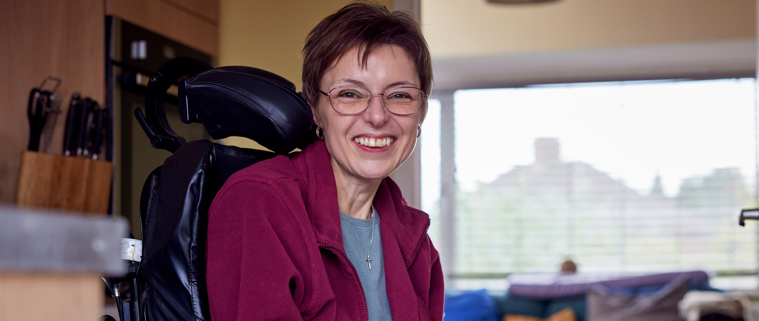 image showing a lady sitting in a wheelchair to highlight the SGN Partnership with Scope