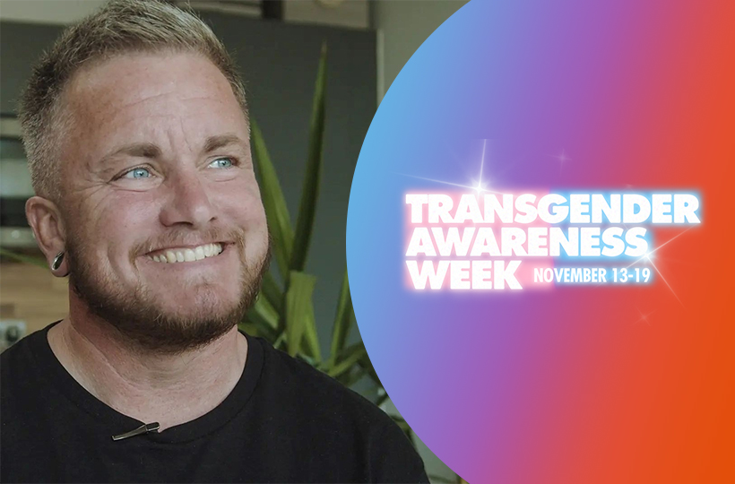 A man smiling looking off camera. Logo for Transgender Awareness Week against a blue, purple and orange gradient.