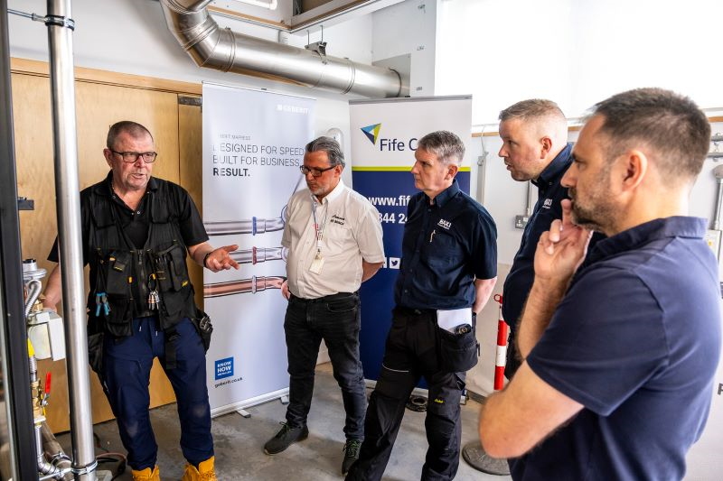 A group of engineers in a training facility