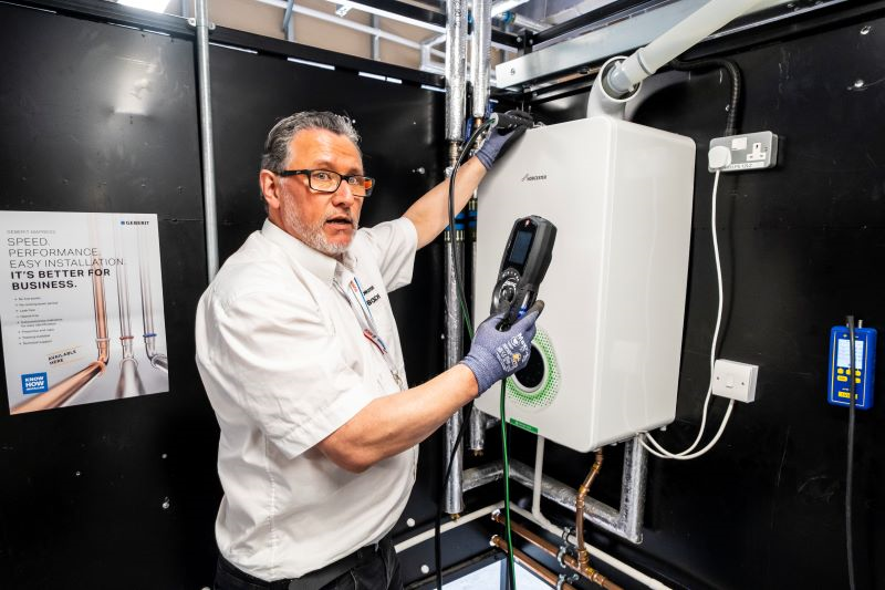 Engineer working on gas boiler