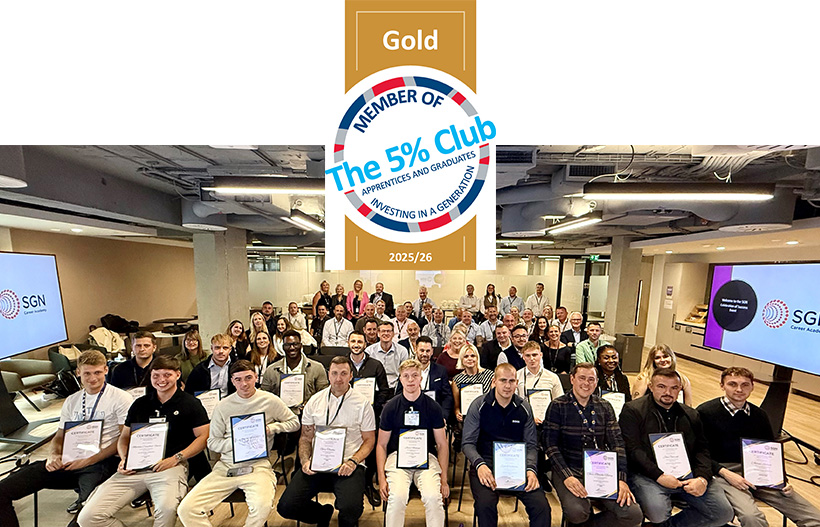 A group of men and women holding certificates