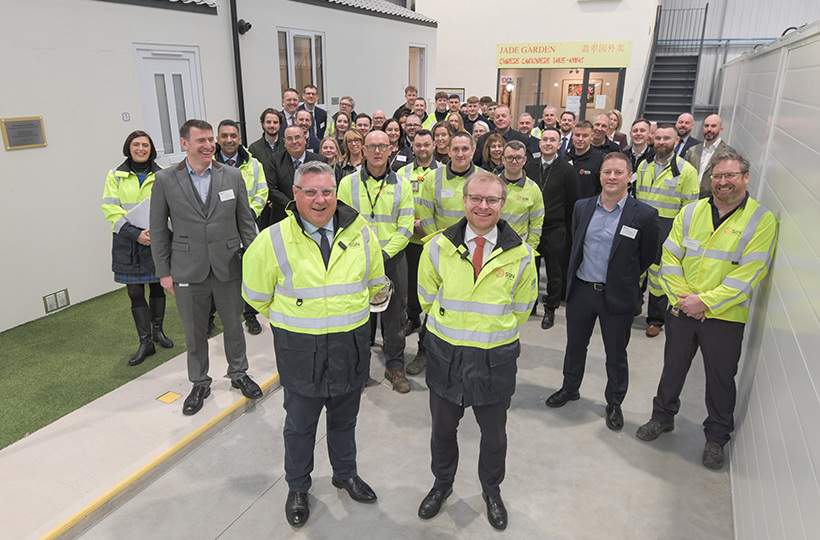 A large group of people in a large indoor space
