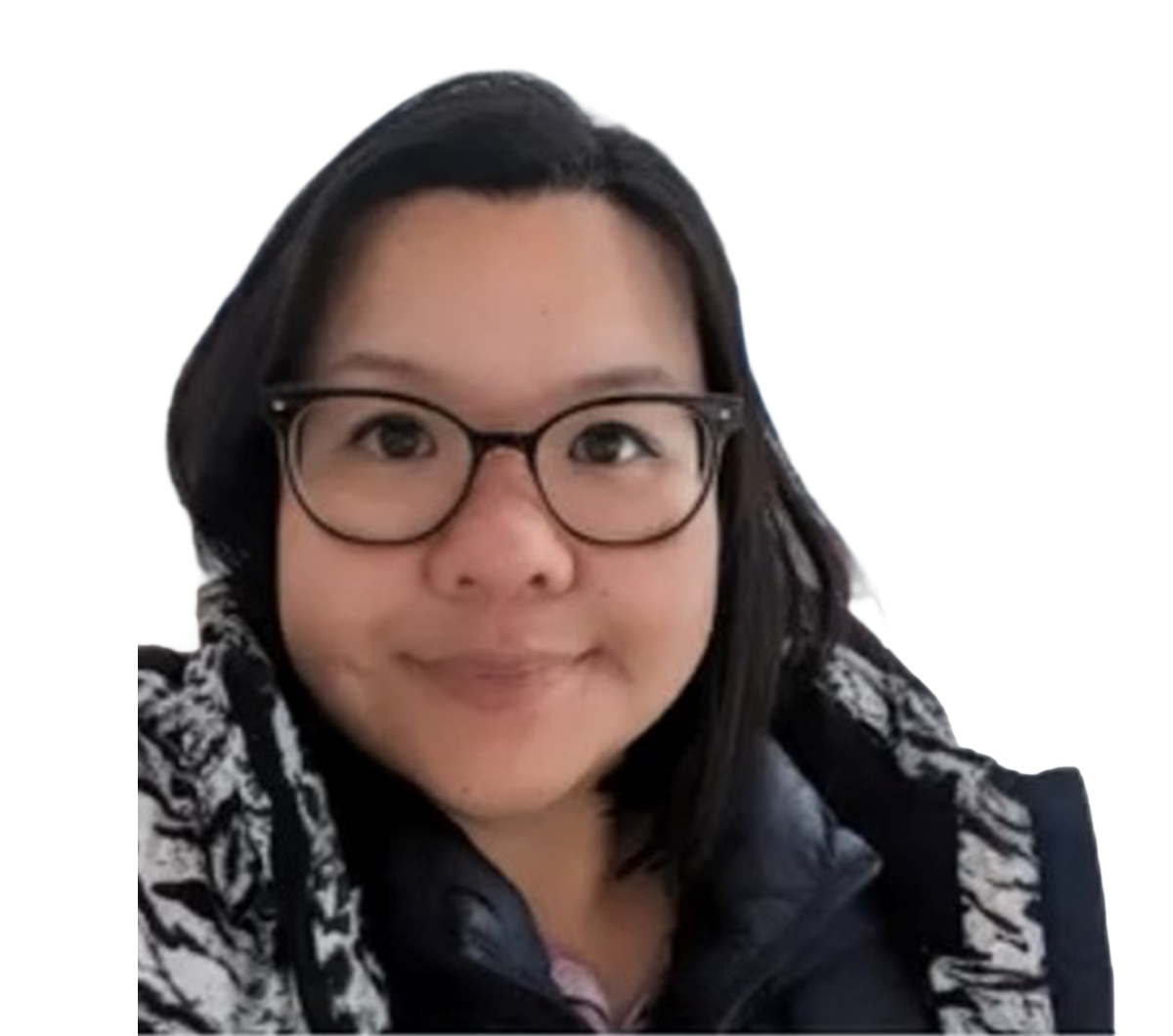 A selfie of an Asian woman looking at the camera against a blank background