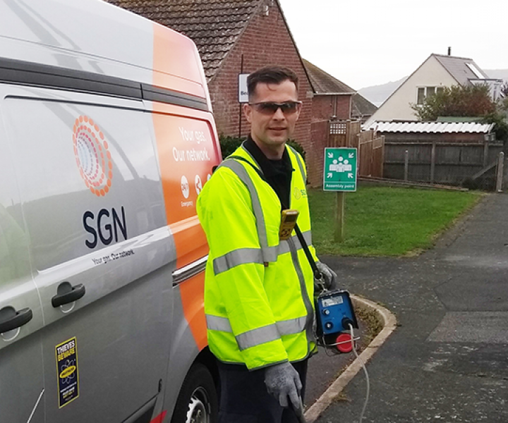  SGN engineer Nathan stands outside his van