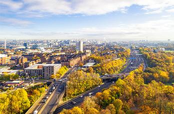 SGN's Environment Strategy front cover features Glasgow's Southside and central part of the city of Glasgow photographed from the air during autumn.