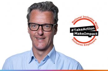 A man with grey hair and glasses wearing a pale blue shirt. Logo for National Inclusion Week 2023 - Take Action Make Impact