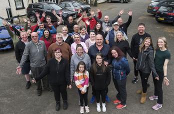 Gary and his family with the charity walkers