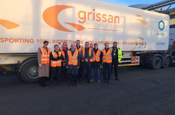 Members of SGN Board and Executive team stand in front of HGV at Grissan's Girvan site