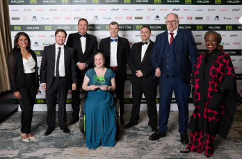 Members of our employee network Ability@SGN celebrate their double win alongside the award's presenter and sponsor